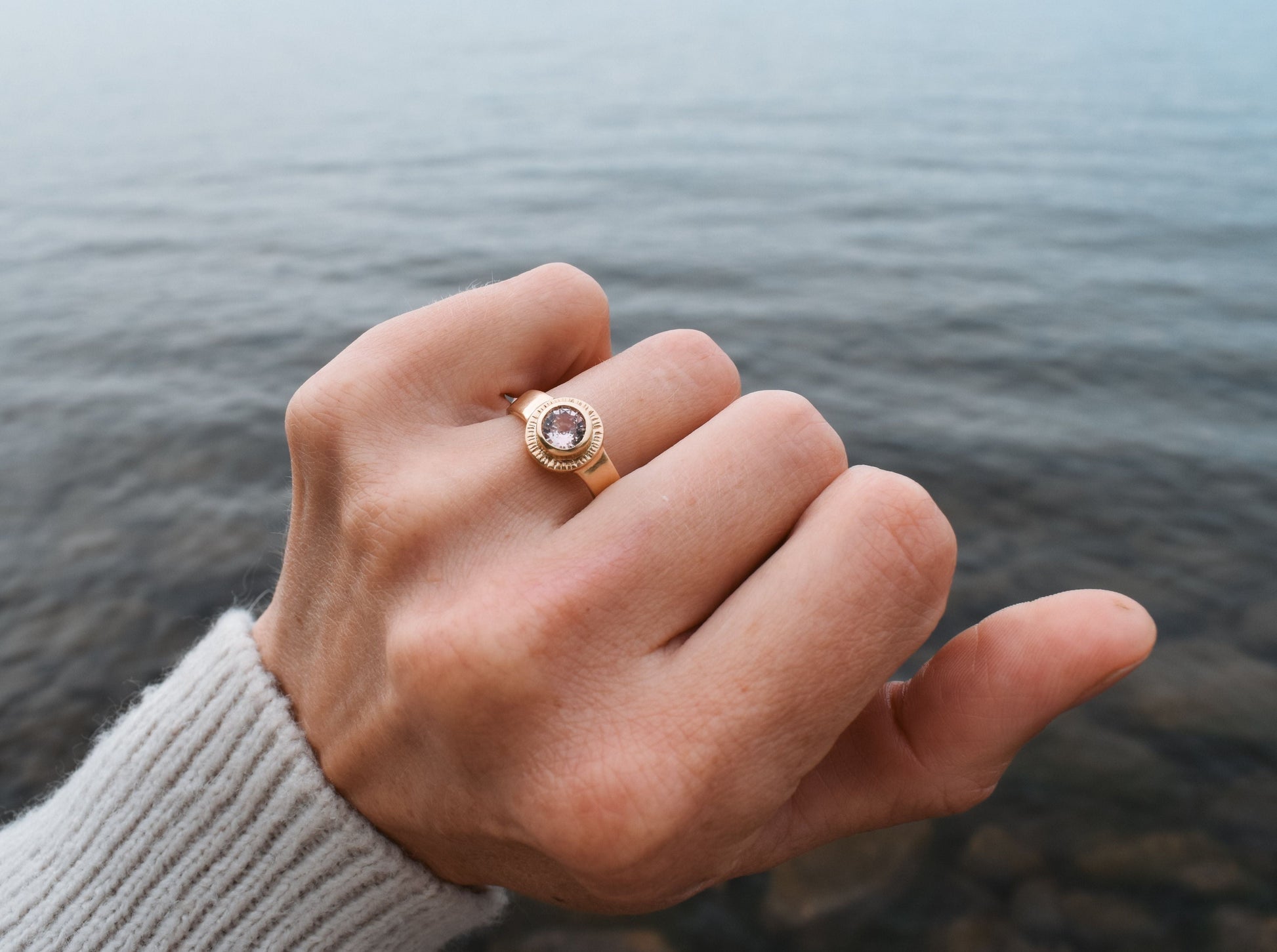Sol Ring, pink sapphire solitaire, padparadscha sapphire ring, sun ring, celestial ring, ethical jewelry, ethical bridal jewelry, sustainably sourced known origin, recycled gold, nature, inspired jewelry, ethical sapphires, natural sapphires