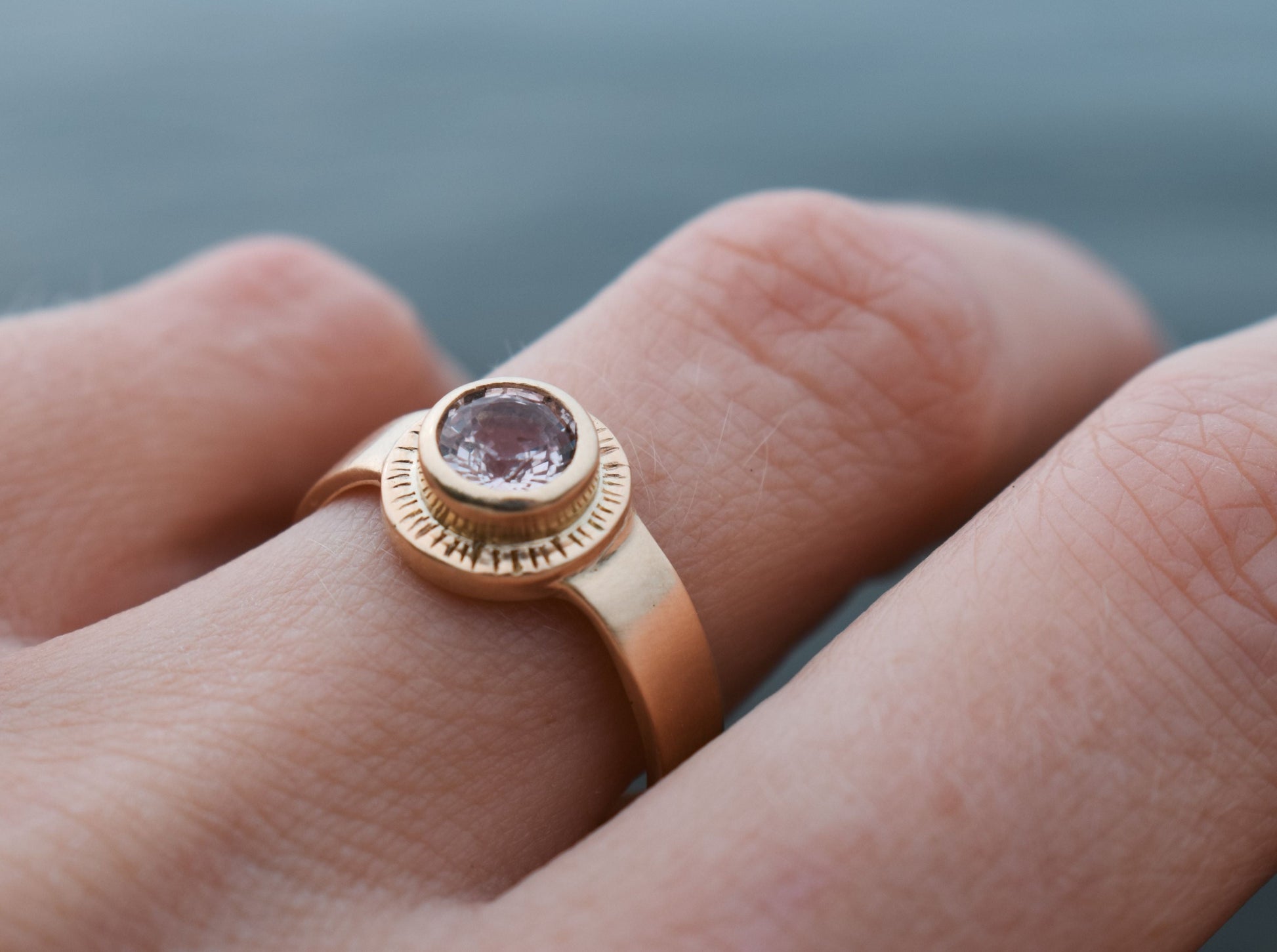 Sol Ring, pink sapphire solitaire, padparadscha sapphire ring, sun ring, celestial ring, ethical jewelry, ethical bridal jewelry, sustainably sourced known origin, recycled gold, nature, inspired jewelry, ethical sapphires, natural sapphires