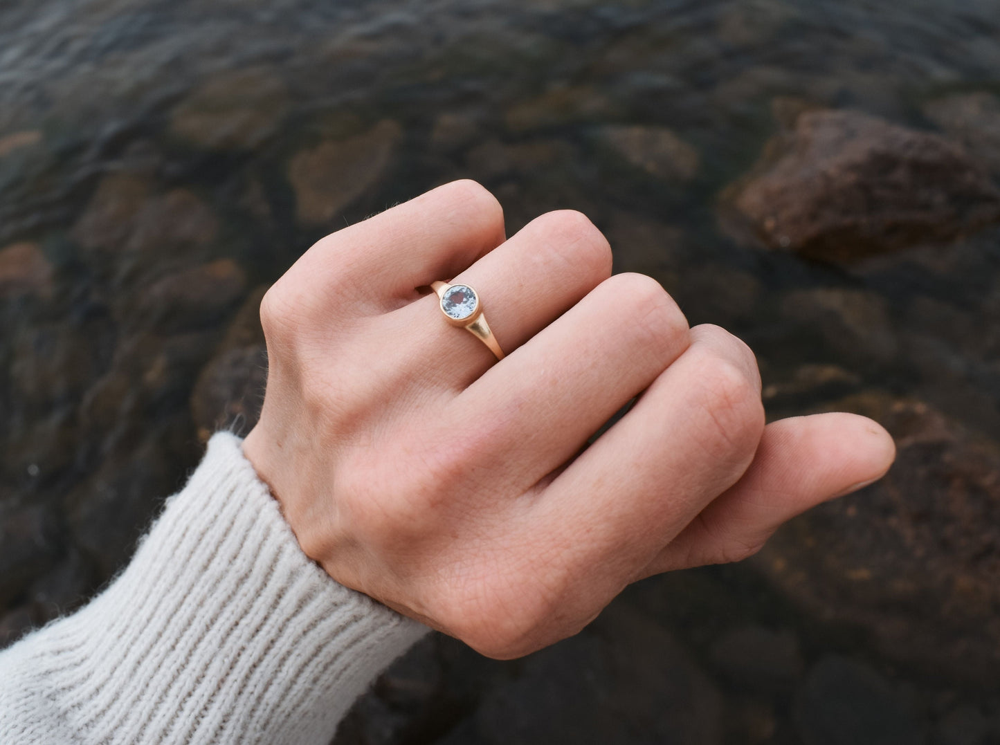 Round white Montana sapphire engagement ring sapphire solitaire ring ethical bridal jewelry sustainably sourced known origin recycled gold nature inspired jewelry ethical sapphires natural sapphires